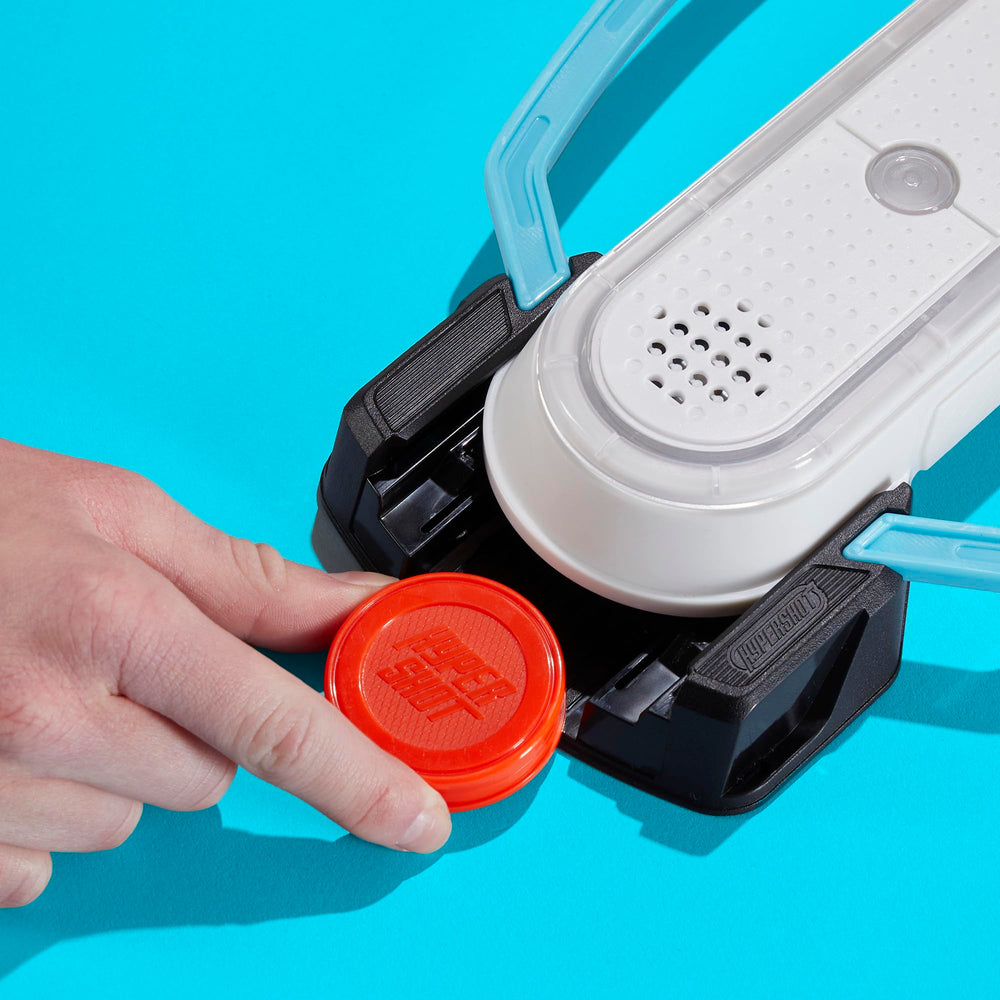 Hasbro Gaming Hypershot included pucks and rails ready for immediate play.