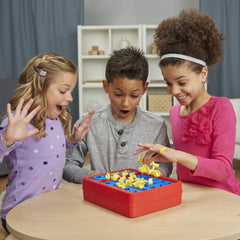Hasbro Gaming Perfection kids playing showing lively interaction and upbeat energy