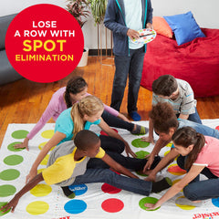 Hasbro Twister Ultimate play area laid out on a smooth floor.
