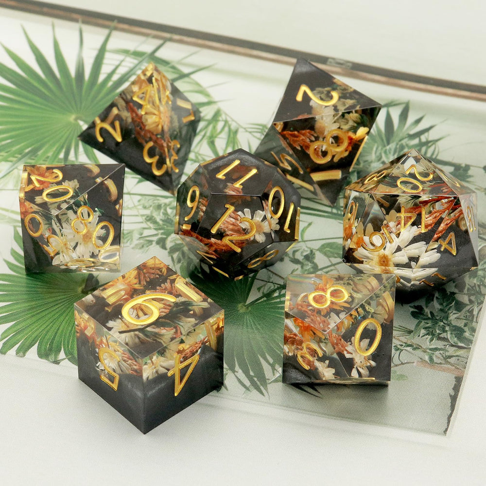 Haxtec metal dice box keeps the set safe and organized.