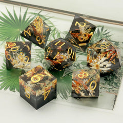 Haxtec metal dice box keeps the set safe and organized.