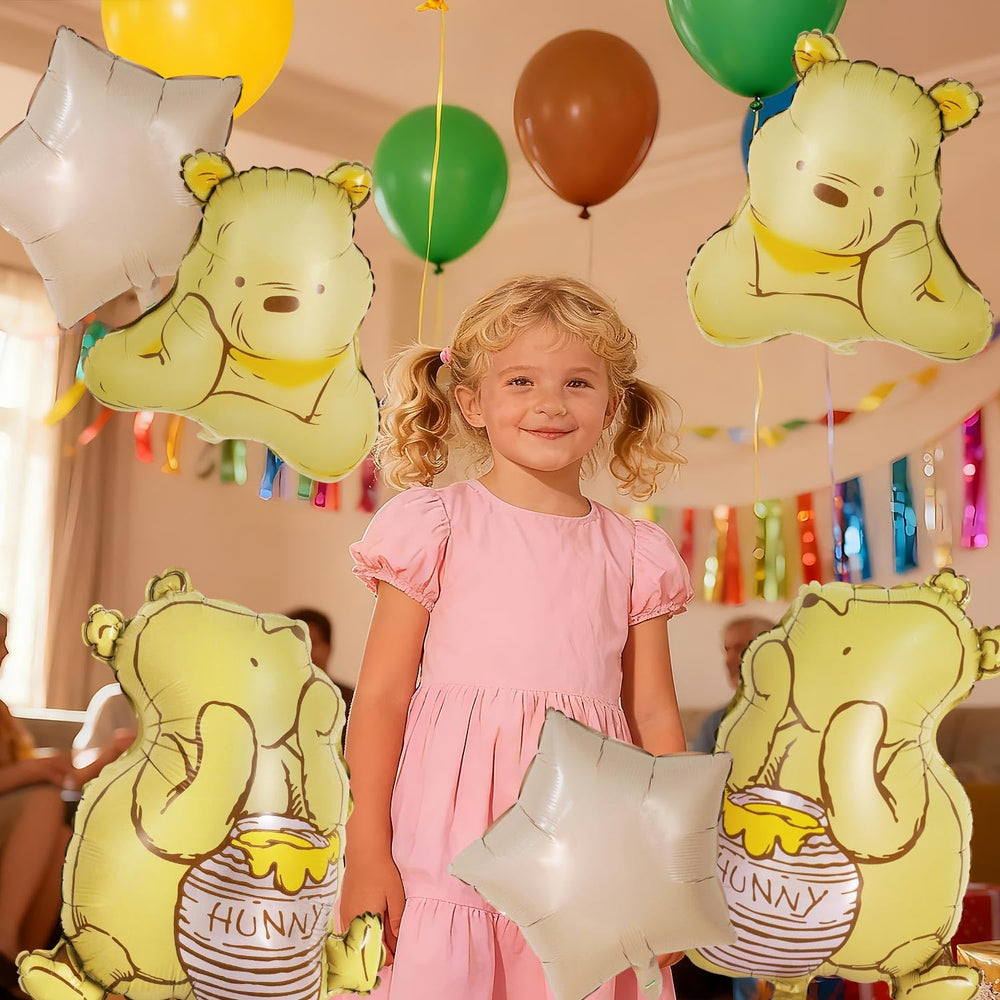 Heboland Pooh photo-friendly balloons frame cute nursery moments.