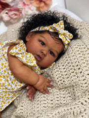 Hengluck reborn baby doll soft body material offers gentle cuddling and posing.
