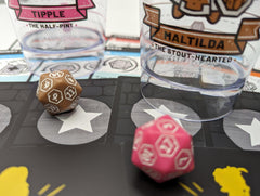 Rollacrit dice and signature move cards highlight clutch moments in battles.