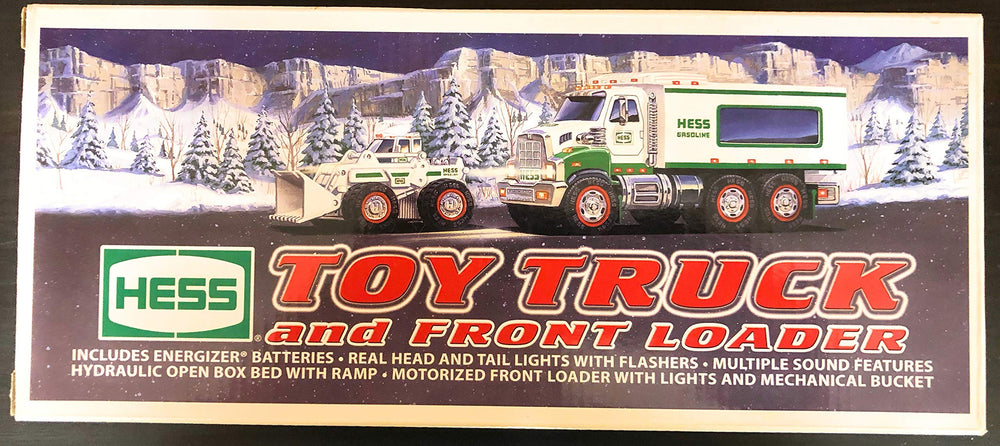 Hess 2008 toy truck with front end loader in an action play scene for creative pretend work.