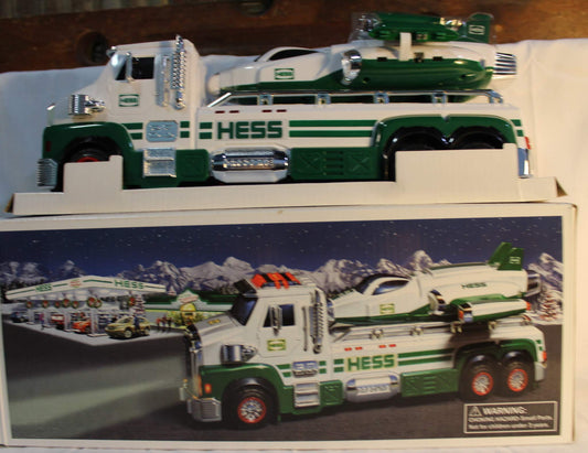 Hess 2014 flatbed toy truck with 50th anniversary badge, ideal for display.