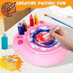 Hewaurorion spin art machine setup with paper and splash guard.