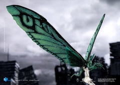 Hiya Toys Mothra Emerald Titan includes a flight stand for airborne displays.
