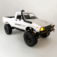 HLSFWDRIVE WPL C24-1 rock crawler front view with rugged chassis for off-road adventures