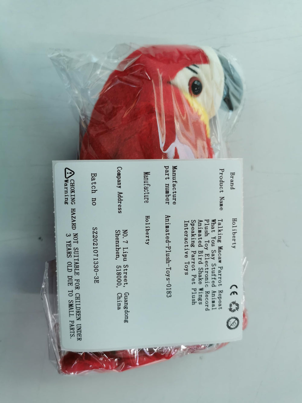 Holiberty Talking Macaw Parrot Plush packaging indicates gift-ready design