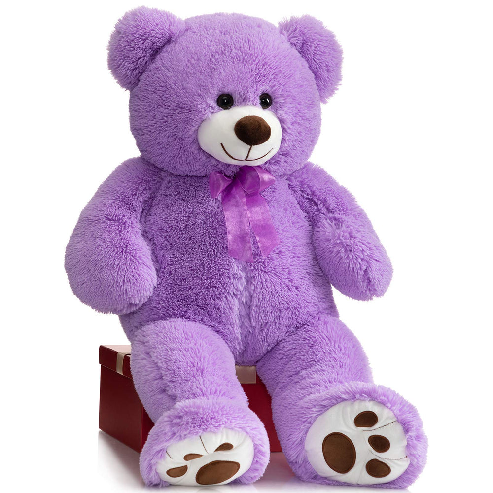HollyHOME 36-inch teddy bear enhances room decor and cozy ambiance.