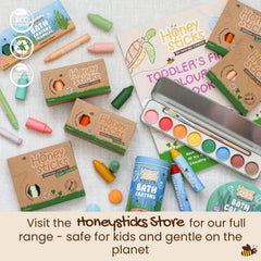 Honeysticks toddler drawing scene with triangle crayons, durable and kid-safe.