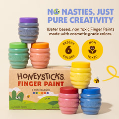 Honeysticks washable finger paint on skin for easy cleanup after playful sessions