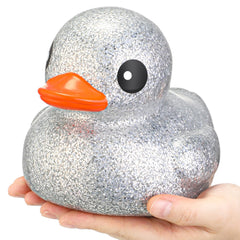 Honoson giant glitter rubber duck in silver, front view, eye-catching decor for parties.