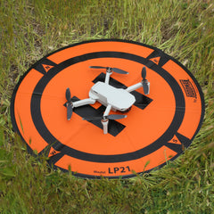 Hoodman LP21 on outdoor ground provides a stable landing surface for Mavic and Spark.