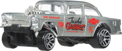 Hot Wheels ruby-red accents highlight classic styling and collectible value.