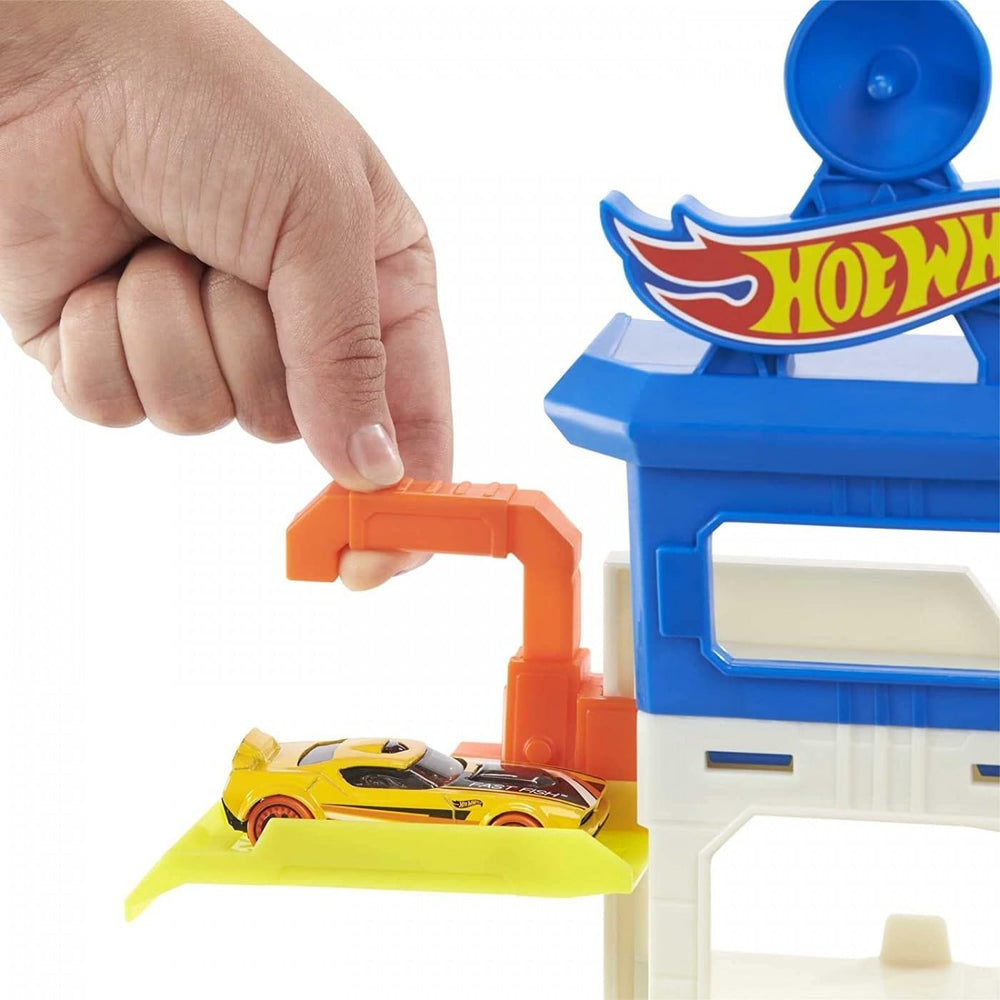 Hot Wheels Attacking Shark Escape Playset elevator action showcases kid powered ascent and car release.