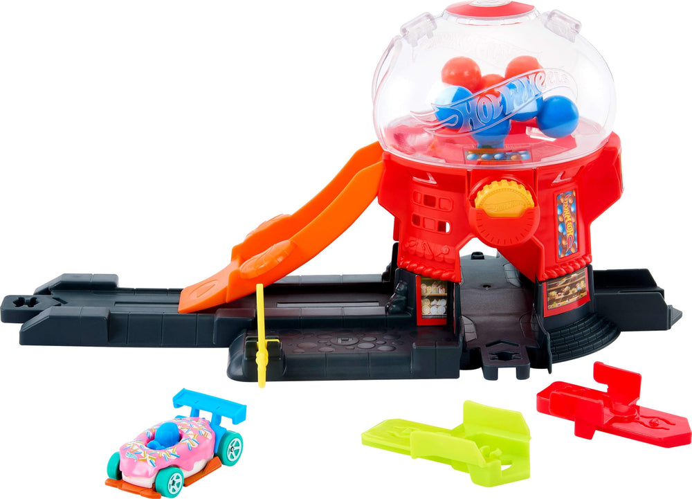 Hot Wheels Downtown Candy Shop donut-shaped vehicle on a glossy track for creative play