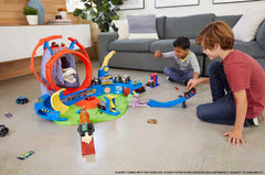 Hot Wheels Monster Trucks dinosaur nemesis challenges trucks in erupting action.