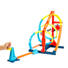 Hot Wheels launcher and target pieces neatly docked on the base