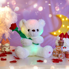 Houwsbaby Glow Teddy Bear on shelf enhances nursery ambience.