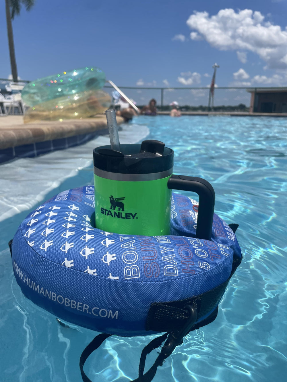 Human Bobber blue large donut-shaped float provides a stable drink holder