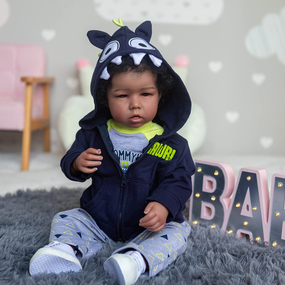 iCradle Reborn Boy Doll eyes and lashes for lifelike gaze during pretend play.