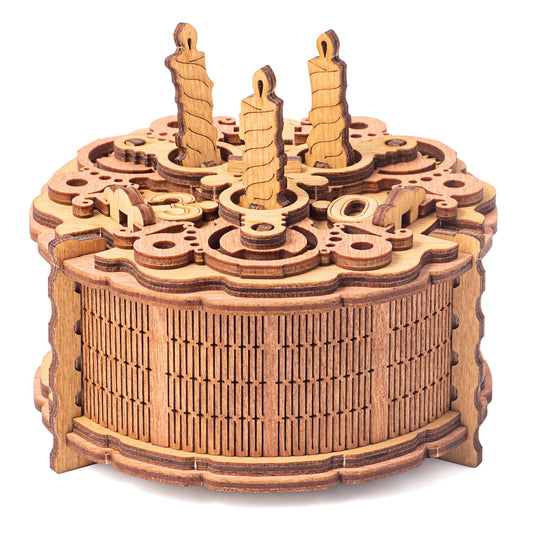 idventure Birthday Cake Puzzle Box open to reveal a hidden cash compartment for gifts