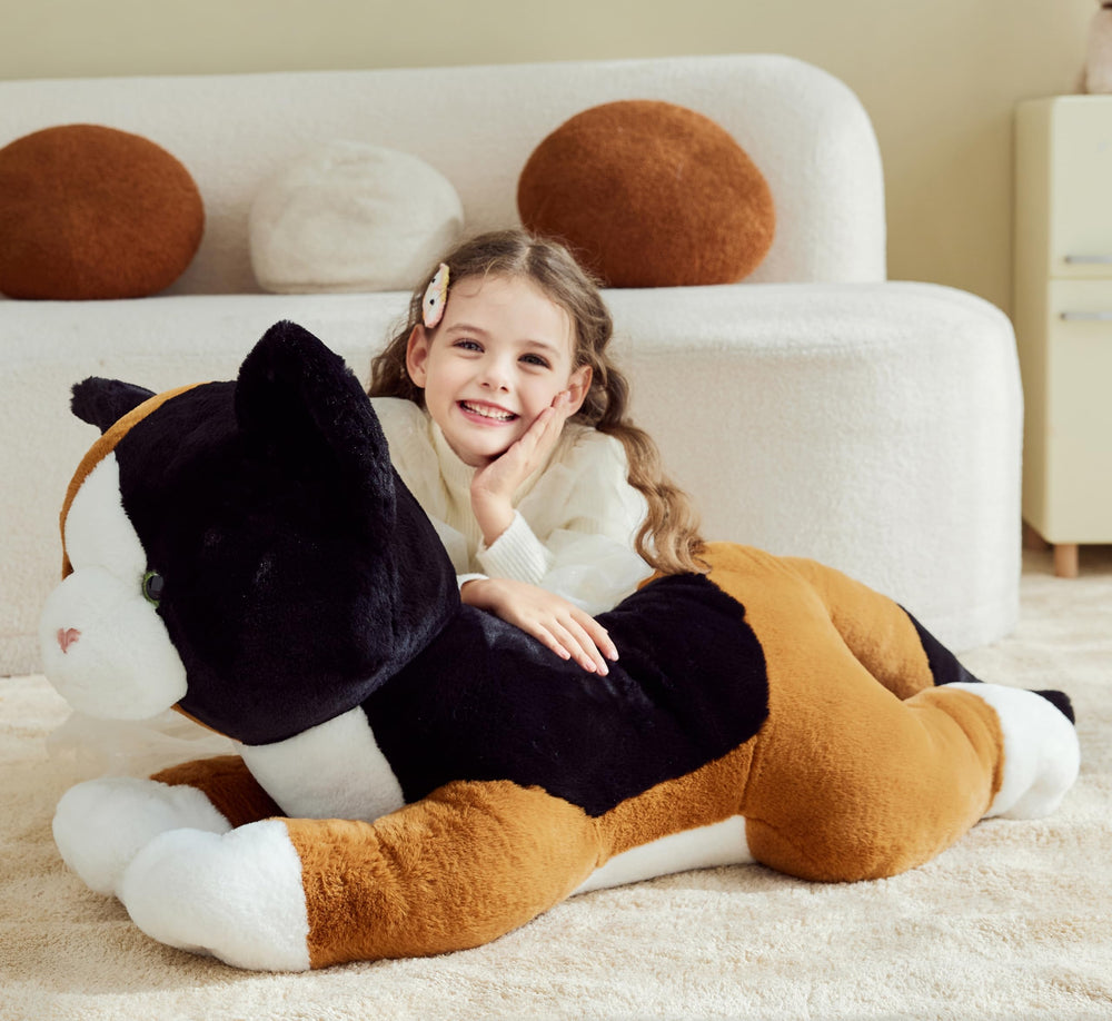IKASA giant calico cat plush, side view, perfect decor accent for a playful bedroom.
