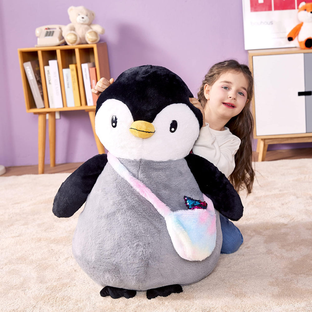 IKASA Penguin satchel with removable fish for interactive play