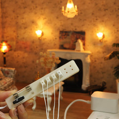 iland dollhouse power strip with switch provides easy on/off control for tiny lights.