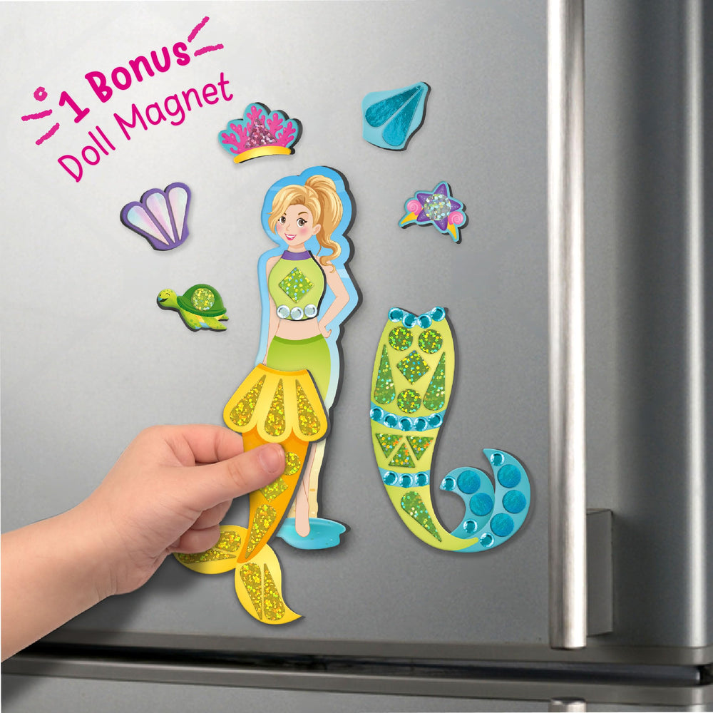 Imagimake studio decorating stickers for customized mermaid looks.