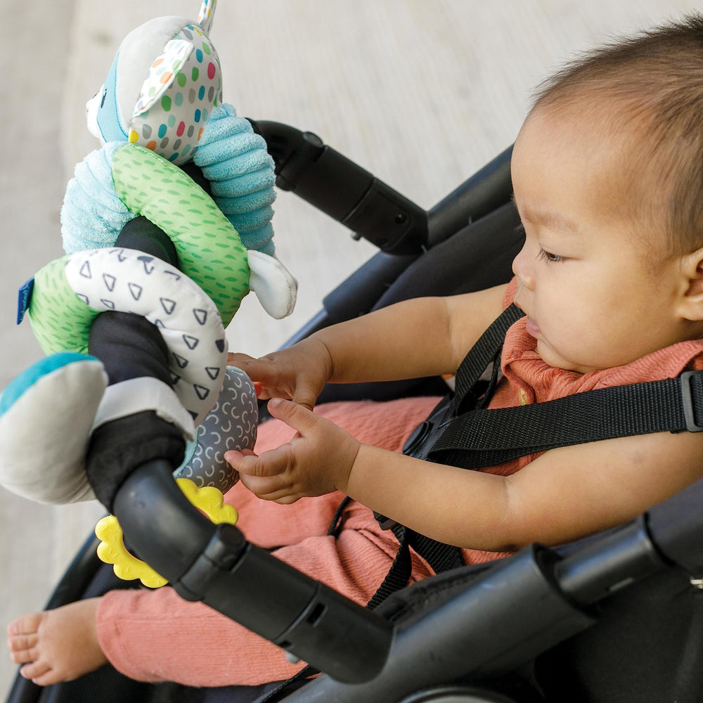 Infantino blue raccoon toy boosts sensory play during daily outings