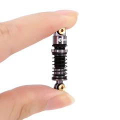 Aluminum threaded long travel shocks enhance stability and wheel travel for 1/24 RC crawlers.
