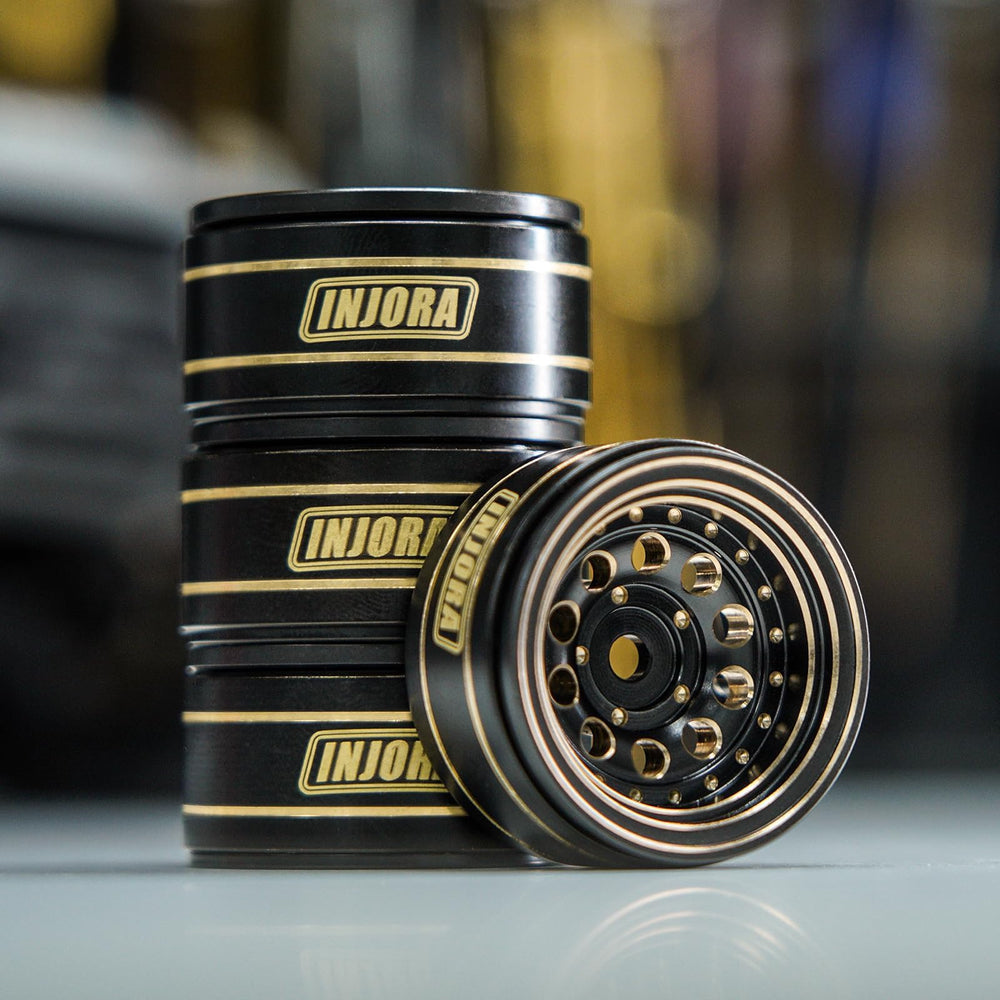 INJORA 1.0 beadlock rim widens wheel spacing for better handling.