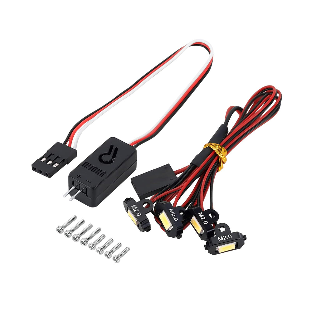 INJORA M2.0 rock lights illuminate the TRX4M front underside for ground visibility.