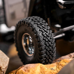 INJORA Maverix MT tires in off-road test scenario demonstrating traction on varied terrain