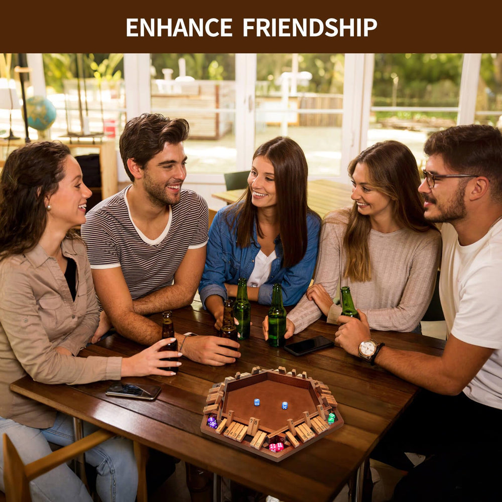 INNOVJOPRO family game play with kids and adults around a table.