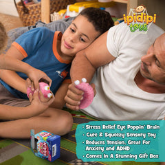 IPIDIPI TOYS Flippy Brain closeup showing bulging popping eyes and squishy texture.