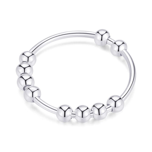 Jacruces 925 silver spinner ring close-up showing bead motion for calm focus
