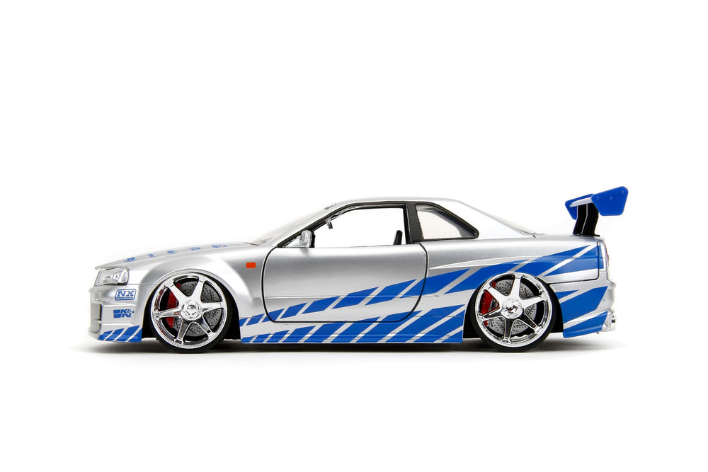 Jada 2002 Nissan Skyline R34 interior and chassis details appeal to collectors.