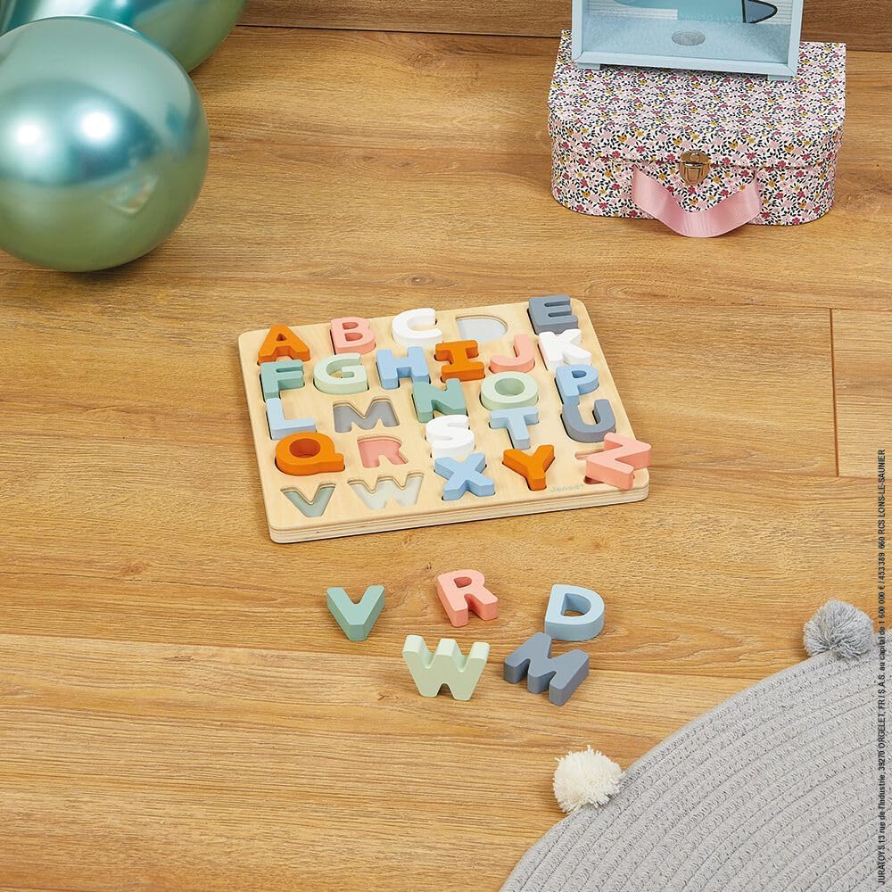 Janod Sweet Cocoon chalk storage built into the edge.