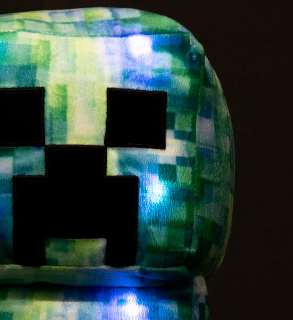 Display-ready Creeper pillow in a Minecraft collection setting