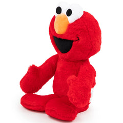 Jay Franco Sesame Street Elmo Pillow Buddy fits perfectly in bed for bedtime snuggles.