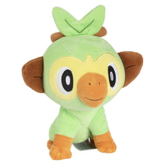 Jazwares Grookey plush face close-up highlighting eyes and details.