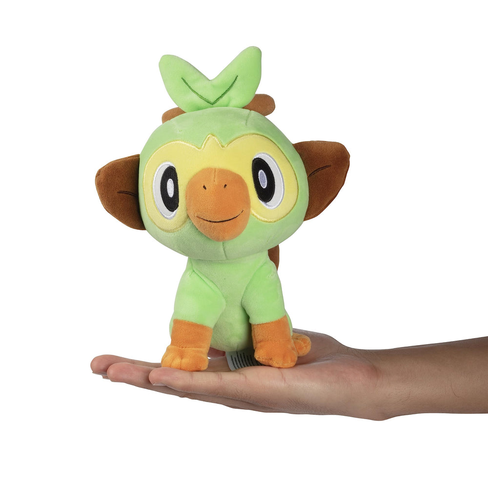 Jazwares Grookey plush in-hand, ideal travel companion for fans.