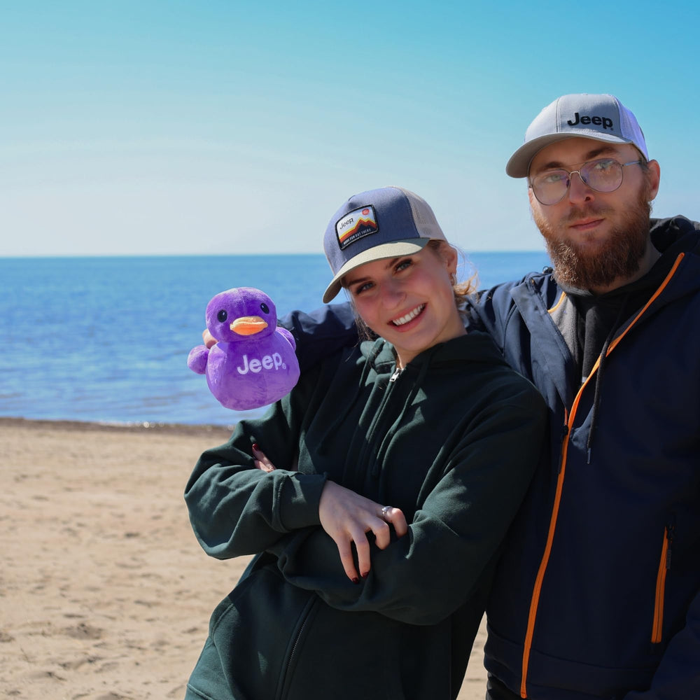 Jeep text logo plush duck, close-up shows authentic branding.