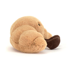 Jellycat Amuseables Croissant shown with other plush pals for a collectible set