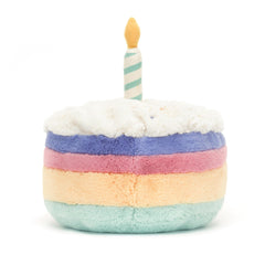 Close-up of frosting and suede candle detail on Jellycat Amuseables Rainbow Birthday Cake.