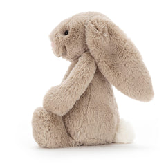 Medium 12-inch Jellycat bunny seated for display or hugs.